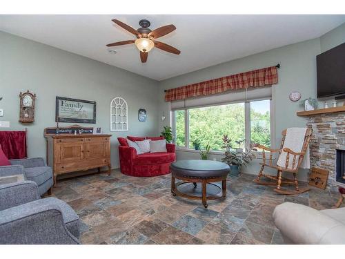 40511 Range Road 273, Rural Lacombe County, AB - Indoor Photo Showing Living Room With Fireplace