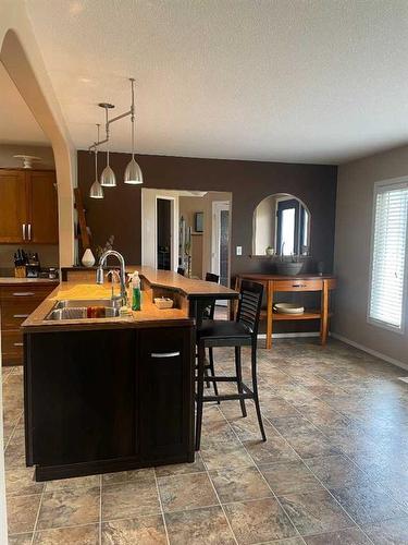 5112 52 Avenue, Consort, AB - Indoor Photo Showing Kitchen With Double Sink