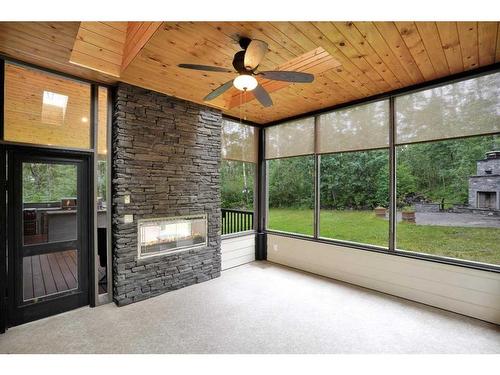 118 Birchcliff Lane, Birchcliff, AB - Indoor Photo Showing Other Room With Fireplace