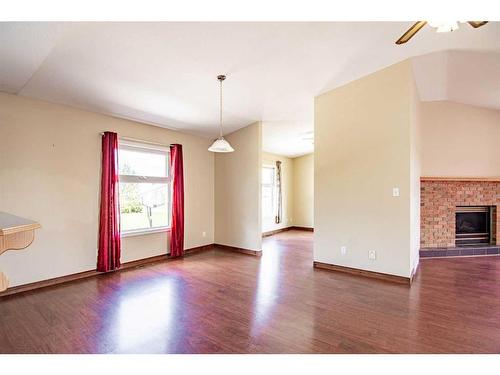 274030 Highway 53, Rural Ponoka County, AB - Indoor Photo Showing Other Room With Fireplace