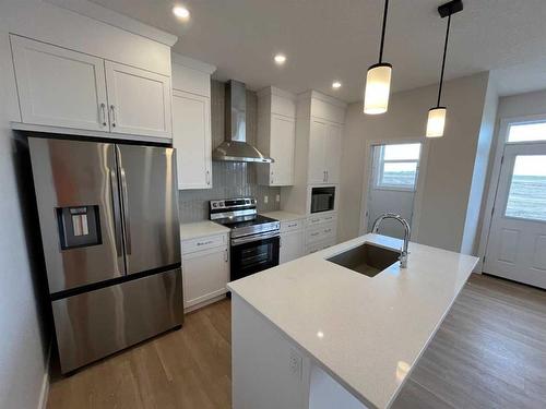 32 Lewiston View Ne, Calgary, AB - Indoor Photo Showing Kitchen With Stainless Steel Kitchen With Upgraded Kitchen