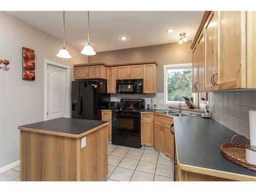 12 Cyrene Crescent, Gull Lake, AB - Indoor Photo Showing Kitchen With Double Sink