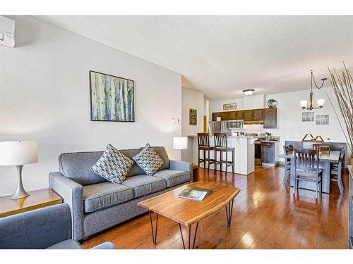 313-1151 Sidney Street, Canmore, AB - Indoor Photo Showing Living Room