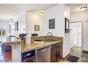 313-1151 Sidney Street, Canmore, AB  - Indoor Photo Showing Kitchen With Double Sink 