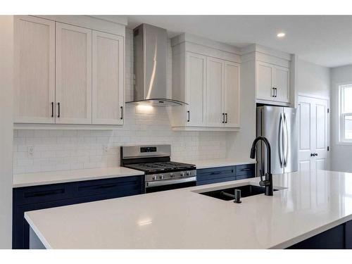 26 Edith Green Nw, Calgary, AB - Indoor Photo Showing Kitchen With Double Sink With Upgraded Kitchen