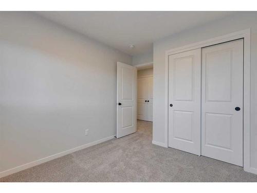 26 Edith Green Nw, Calgary, AB - Indoor Photo Showing Other Room