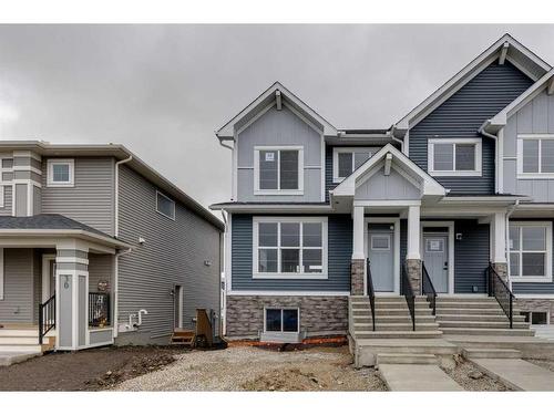 26 Edith Green Nw, Calgary, AB - Outdoor With Facade