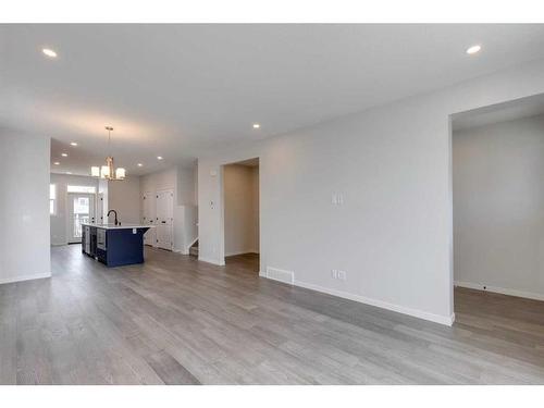 26 Edith Green Nw, Calgary, AB - Indoor Photo Showing Living Room