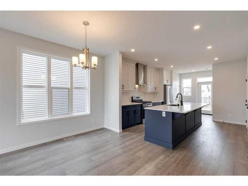 26 Edith Green Nw, Calgary, AB - Indoor Photo Showing Kitchen With Upgraded Kitchen