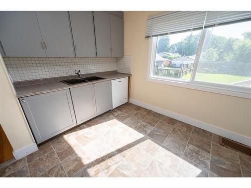 5341 43 Avenue, Red Deer, AB - Indoor Photo Showing Kitchen With Double Sink