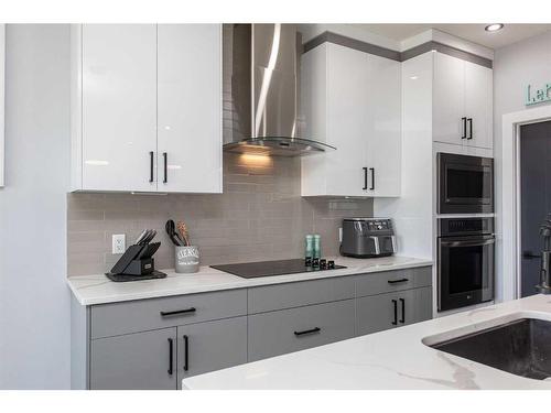 4175 Ryders Ridge Blvd, Sylvan Lake, AB - Indoor Photo Showing Kitchen