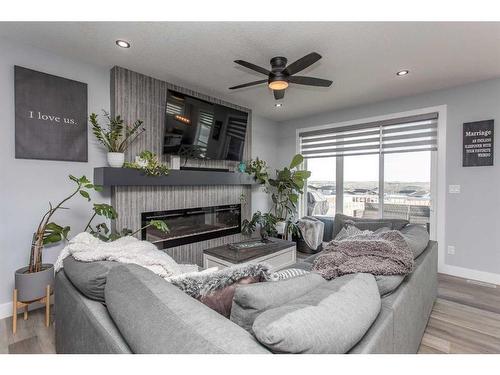 4175 Ryders Ridge Blvd, Sylvan Lake, AB - Indoor Photo Showing Living Room With Fireplace