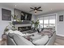 4175 Ryders Ridge Blvd, Sylvan Lake, AB  - Indoor Photo Showing Living Room With Fireplace 