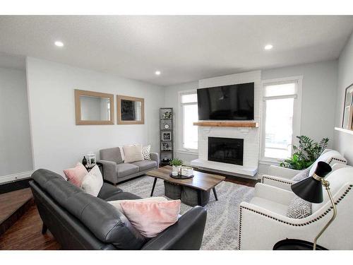 16 Halman Crescent, Red Deer, AB - Indoor Photo Showing Living Room With Fireplace