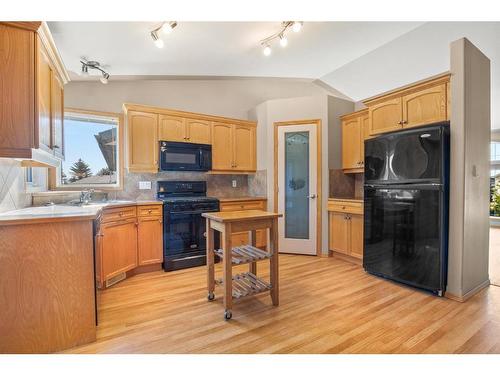 95 Dubois Crescent, Red Deer, AB - Indoor Photo Showing Kitchen With Double Sink