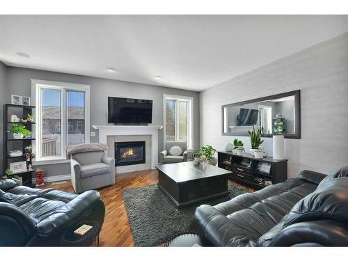 9 Ashmore Close, Red Deer, AB - Indoor Photo Showing Living Room With Fireplace