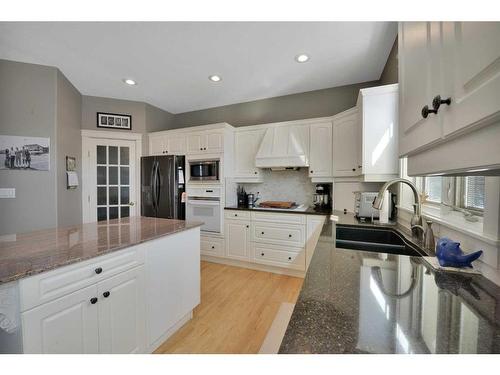 9 Ashmore Close, Red Deer, AB - Indoor Photo Showing Kitchen With Double Sink