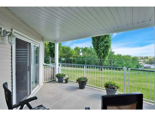 L01-6118 53 Avenue, Red Deer, AB - Outdoor With Deck Patio Veranda With Exterior