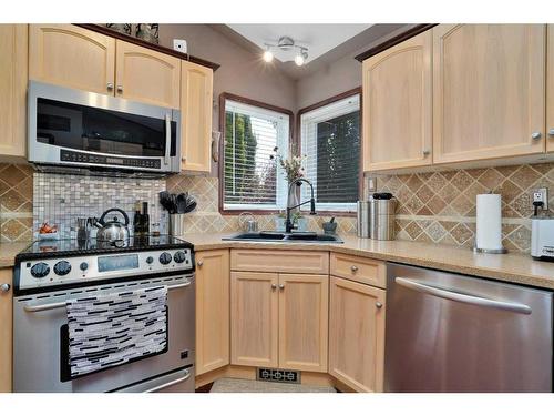 105 Dempsey Street, Red Deer, AB - Indoor Photo Showing Kitchen With Stainless Steel Kitchen
