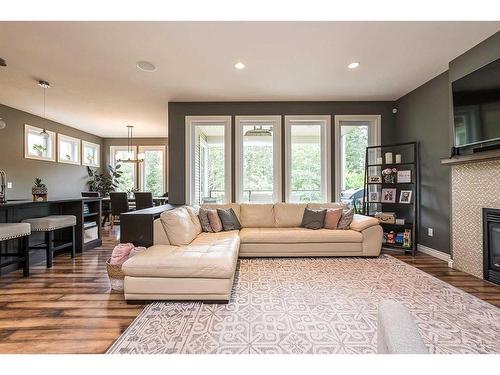 57 Garrison Circle, Red Deer, AB - Indoor Photo Showing Living Room With Fireplace