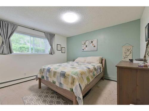 101-4814 46 Street, Red Deer, AB - Indoor Photo Showing Bedroom