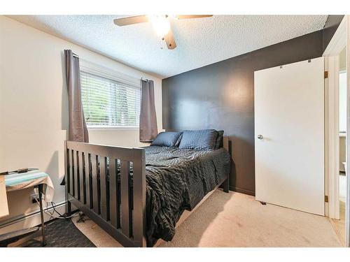 101-4814 46 Street, Red Deer, AB - Indoor Photo Showing Bedroom