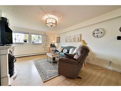 101-4814 46 Street, Red Deer, AB - Indoor Photo Showing Living Room