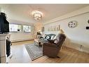 101-4814 46 Street, Red Deer, AB  - Indoor Photo Showing Living Room 