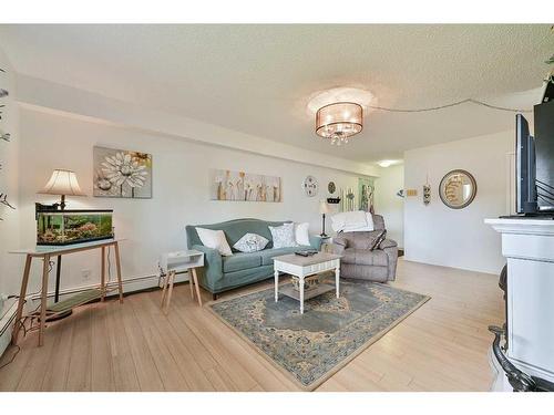 101-4814 46 Street, Red Deer, AB - Indoor Photo Showing Living Room