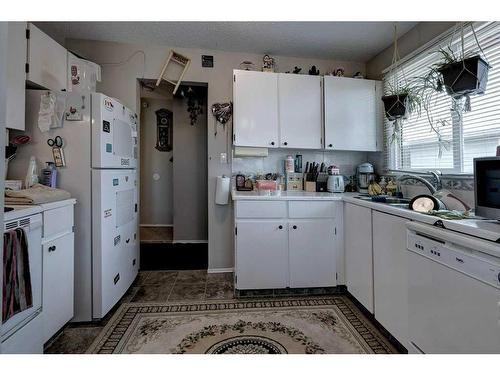 19 George Crescent, Red Deer, AB - Indoor Photo Showing Kitchen With Double Sink