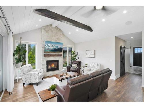 10 Sweetgrass Place, Sylvan Lake, AB - Indoor Photo Showing Living Room With Fireplace