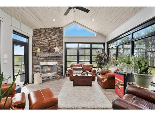 10 Sweetgrass Place, Sylvan Lake, AB - Indoor Photo Showing Living Room With Fireplace