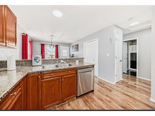 143 Lanterman Close, Red Deer, AB - Indoor Photo Showing Kitchen With Double Sink