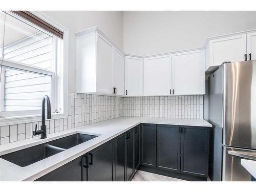 28 Vincent Close, Red Deer, AB - Indoor Photo Showing Kitchen With Double Sink