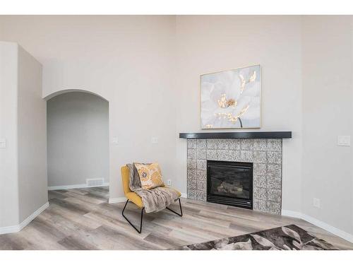 28 Vincent Close, Red Deer, AB - Indoor Photo Showing Living Room With Fireplace