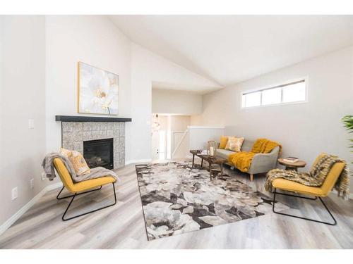 28 Vincent Close, Red Deer, AB - Indoor Photo Showing Living Room With Fireplace