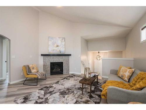 28 Vincent Close, Red Deer, AB - Indoor Photo Showing Living Room With Fireplace