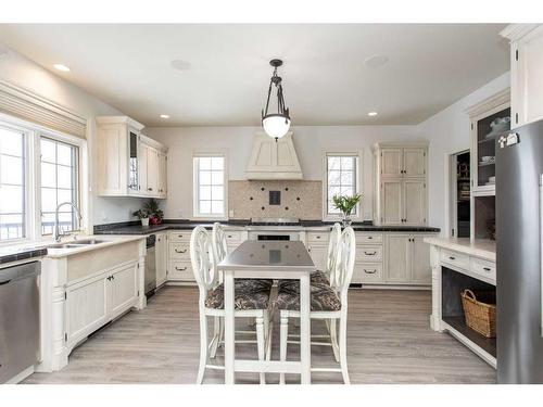 217-27111 Highway 597, Rural Lacombe County, AB - Indoor Photo Showing Kitchen With Double Sink