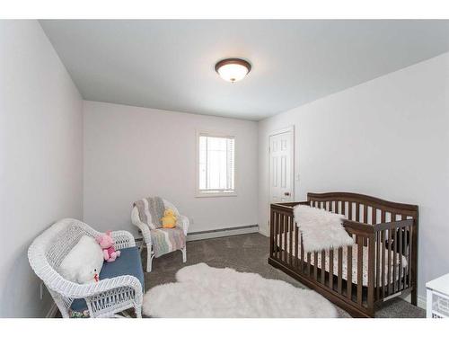 217-27111 Highway 597, Rural Lacombe County, AB - Indoor Photo Showing Bedroom