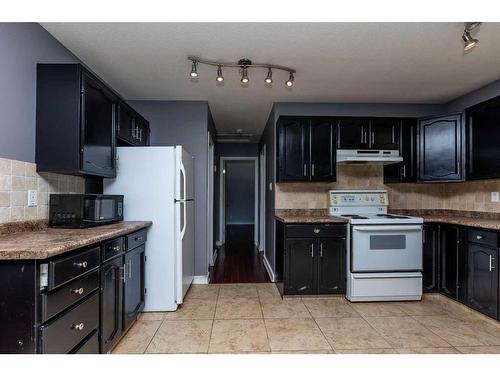 69 Nagel Avenue, Red Deer, AB - Indoor Photo Showing Kitchen