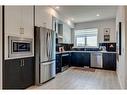 303-8235 8 Avenue Sw, Calgary, AB  - Indoor Photo Showing Kitchen With Upgraded Kitchen 