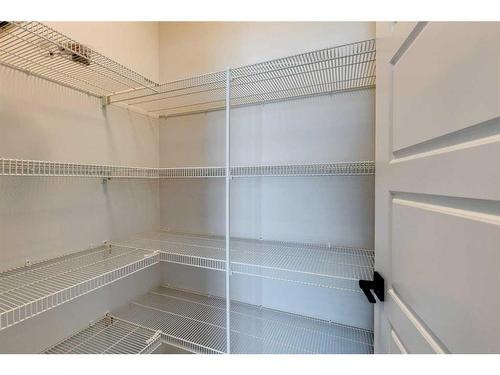 342 Sora Way Se, Calgary, AB - Indoor With Storage