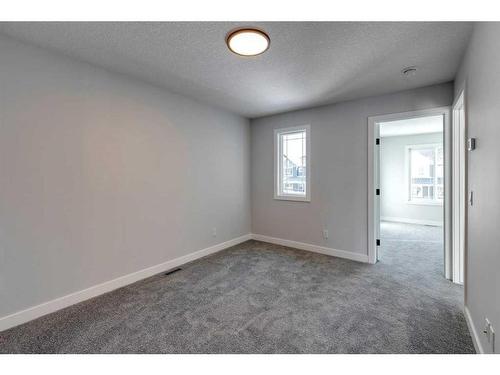 342 Sora Way Se, Calgary, AB - Indoor Photo Showing Other Room