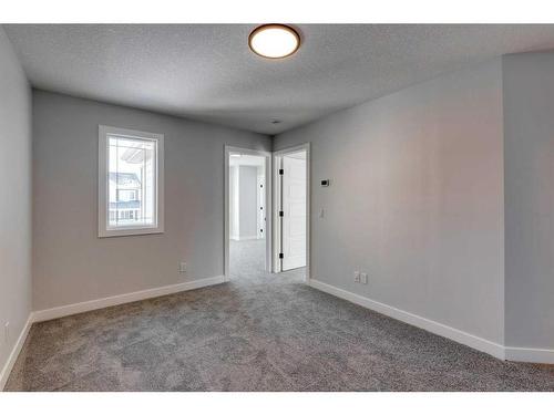 342 Sora Way Se, Calgary, AB - Indoor Photo Showing Other Room