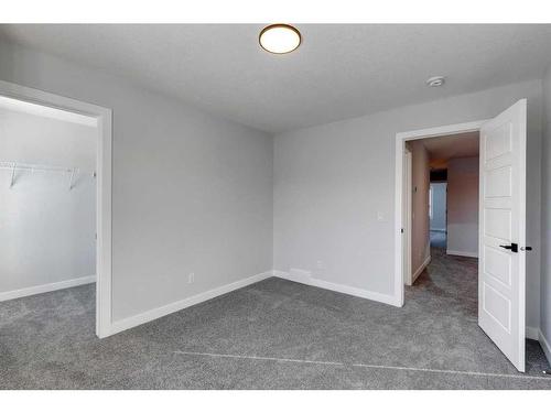 342 Sora Way Se, Calgary, AB - Indoor Photo Showing Other Room