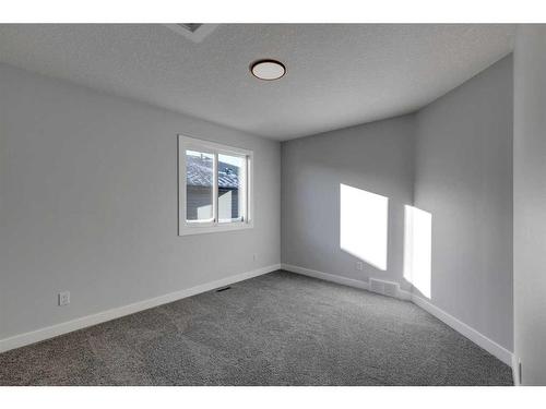 342 Sora Way Se, Calgary, AB - Indoor Photo Showing Other Room