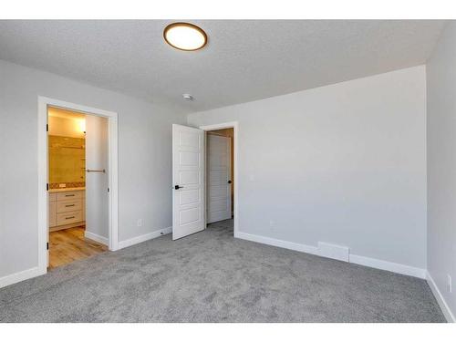 342 Sora Way Se, Calgary, AB - Indoor Photo Showing Other Room