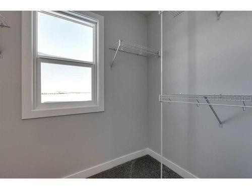 342 Sora Way Se, Calgary, AB - Indoor With Storage