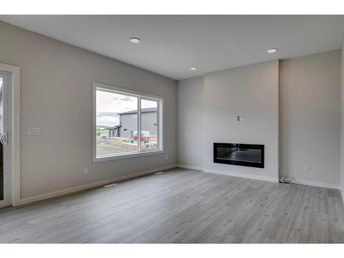 65 Emmett Crescent, Red Deer, AB - Indoor Photo Showing Living Room With Fireplace