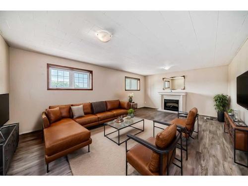 250070 Township Road 434, Rural Ponoka County, AB - Indoor Photo Showing Living Room With Fireplace